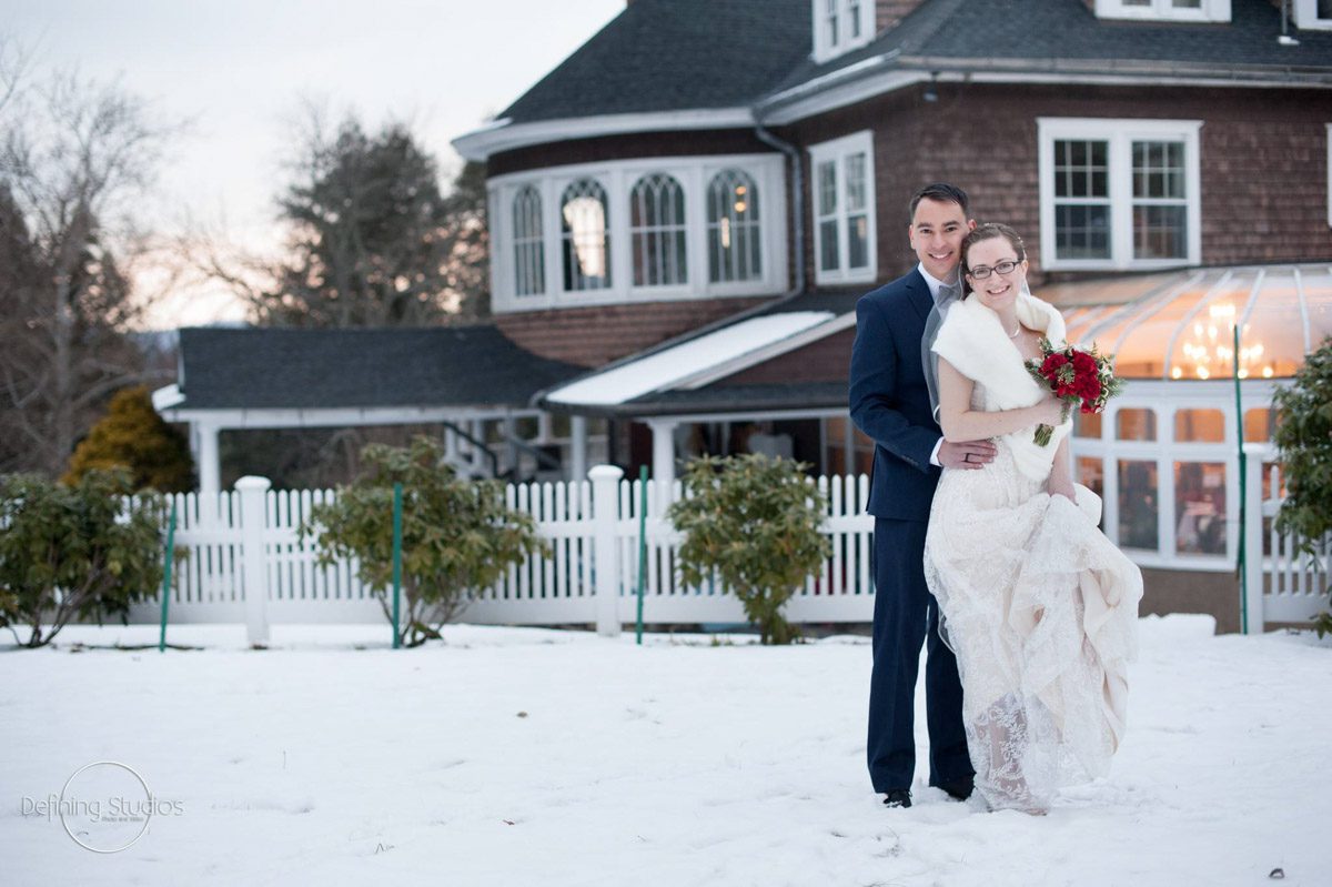 bride-groom-with-winter-sunset-and-mansion-for-background