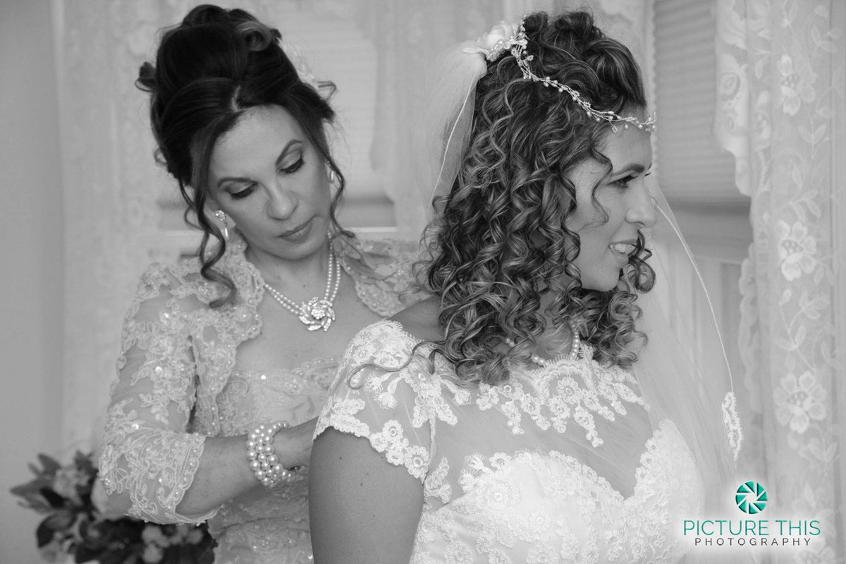 a-victorian-era-wedding-with-m0m-helping-bride-to-get-dressed
