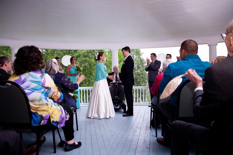 cuban-flair-wedding-guests-clapping-as-vows-complete