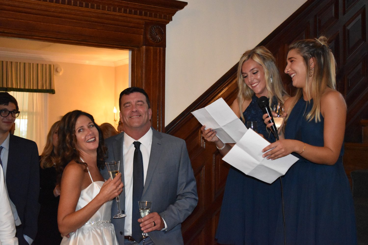 september-newlyweds-laughing-at-daughters-speech